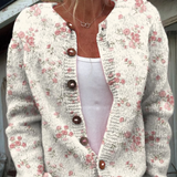 Monika – Cremefarbene Strickjacke mit kleinen Rosen von Amora Bern