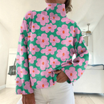Vreneli – Rosa Rollkragenpullover mit Blumenmuster von Amora Bern