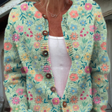 Claudia – Mintgrüne Strickjacke mit bunten Blumen von Amora Bern