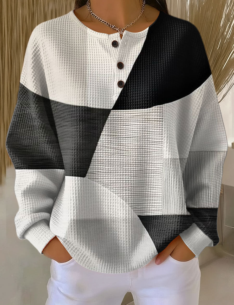 Christa – Patchwork-Pullover in Schwarz und Weiss von Amora Bern