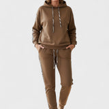 Adelmut – Kapuzenpullover & Jogginghose Set von Amora Bern