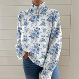 Emmeli – Weiss-blauer Rollkragenpullover mit Blumenmuster von Amora Bern